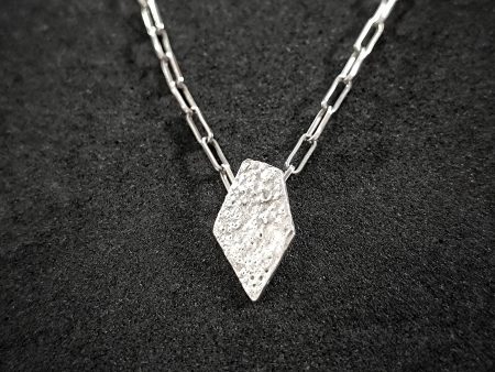 Modern unisex geometric fired pendant in a link chain