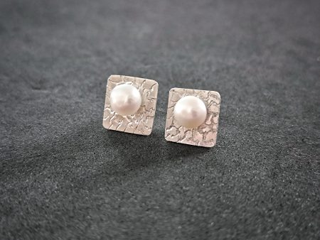 Silver stud earrings with fresh water pearl
