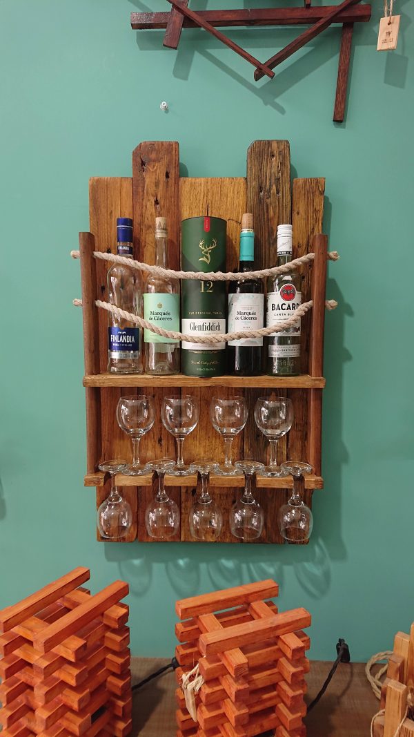 Rustic, repurposed pine and rope wall-mounted bottle rack with wine glass shelf