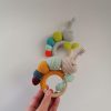 Crocheted Rattle-teething toy Caterpillar yellow