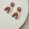 Ivory and mauve flower/ rainbow polymer clay earrings