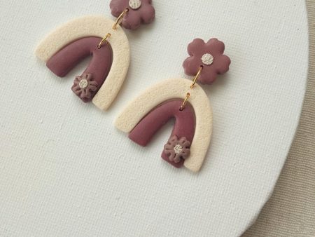 Ivory and mauve flower/ rainbow polymer clay earrings