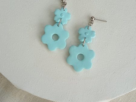 Light blue flowers dangle earrings