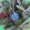 Pebble Ornaments On Wood Slices - Image 2