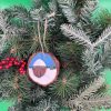 Pebble Ornaments On Wood Slices - Image 11