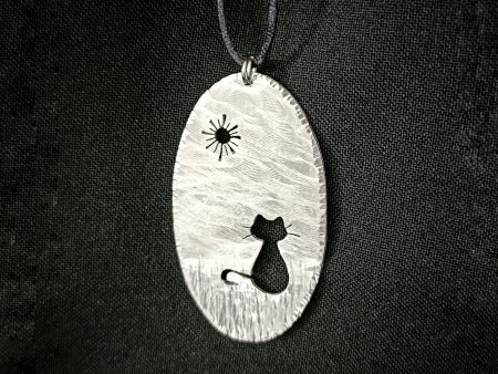 Cat in the sun pendant