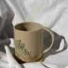 Ceramic mug with real leaves imprint