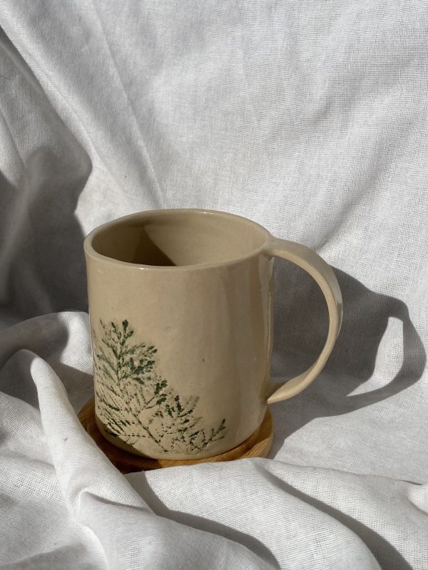 Ceramic mug with real leaves imprint