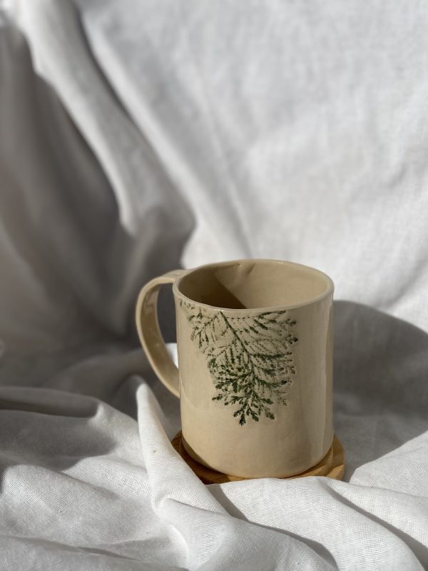 Ceramic mug with real leaves imprint