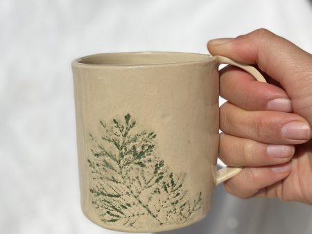 Ceramic mug with real leaves imprint
