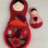 Adorable mum and baby felt nesting dolls