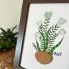 Pretty Floral Arrangement Made With Sea Pottery and Seaglass