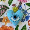 Beautiful the 'All-Seeing Heart' Ornament: A sea-blue heart ornament. - Image 6