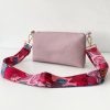 pink messenger bag with floral strap front