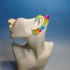 Rainbow colored fairy ear design on a mannequin