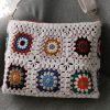 Beige granny square crochet bag with zipper and felt lining