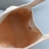 Earth tone crochet granny square bag with magnetic closure and felt lining