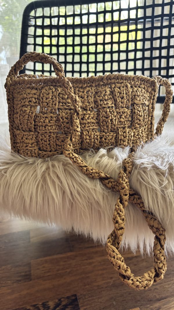 Discover the Effortless Elegance of the Allegra Woven Raffia Bag
