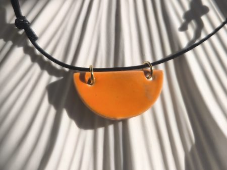 "Half Sun" – Handmade Ceramic Necklace in Orange