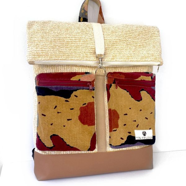 backpack beige with large pockets 1