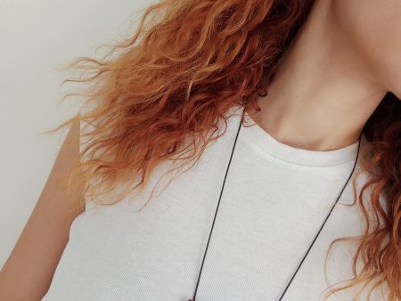 Set of burgundy necklace and stud earrings