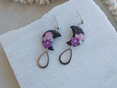 Black floral crescent earrings