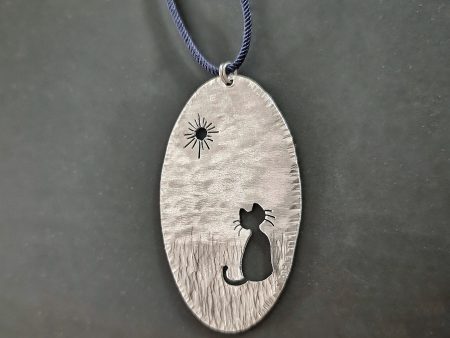 Cat in the sun pendant