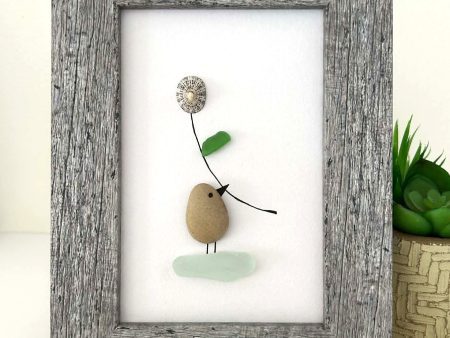 Minimalist Coastal Art – Pebble & Seaglass Scene with a Cute Bird Holding a Flower